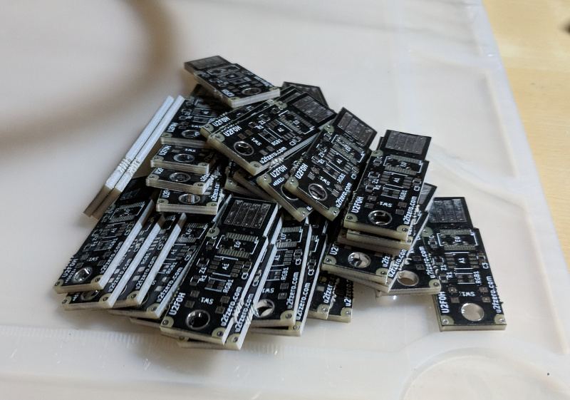 A big pile of U2F tokens.
