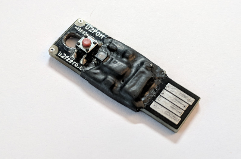 A finished U2F Zero token, covered in liquid electrical tape.